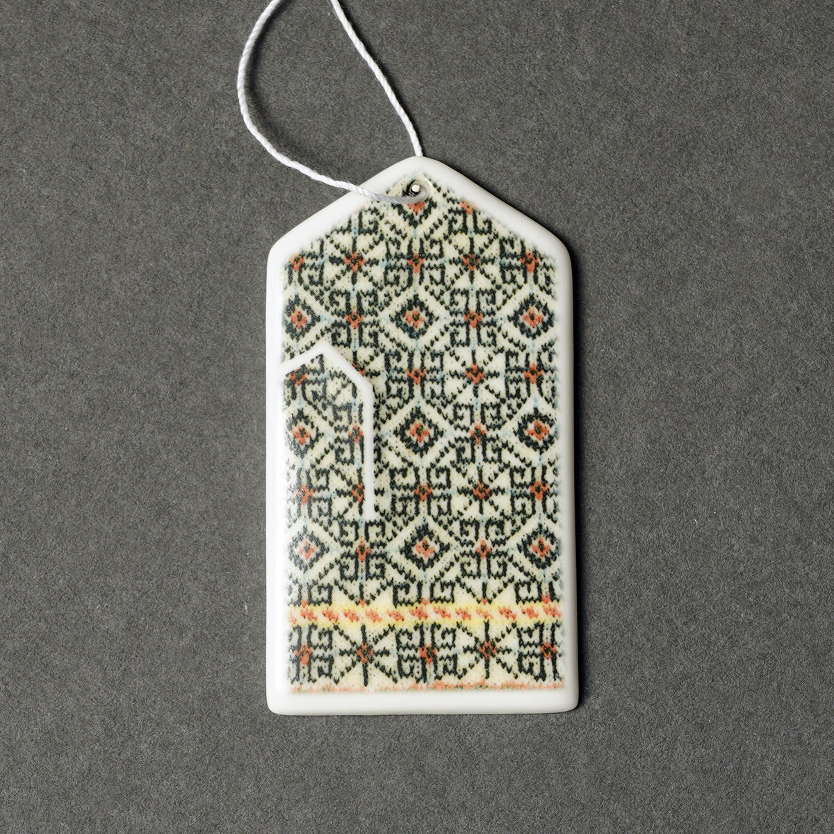 Porcelāna rotājumi - cimdiņi ar apdruku